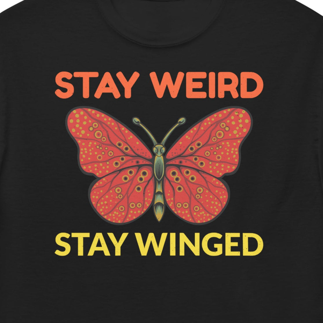 T-shirt with 'Stay Weird, Stay Winged' text